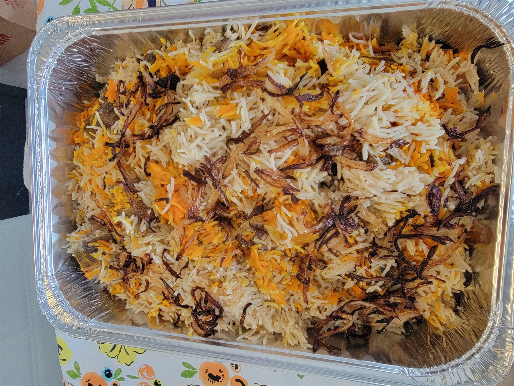 Large tray of Pakistani biryani for halal catering